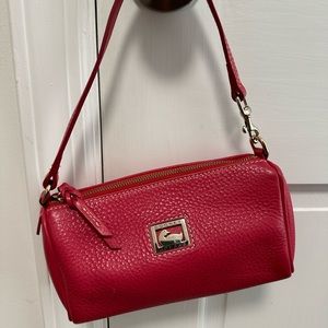 Small pink Dooney and Bourke purse.